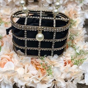 Black and gold caged purse